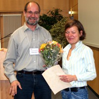 Den ASI-Posterpreis 2009 gewann Kirsten Isensee - Gratulation durch Matthias Gehre